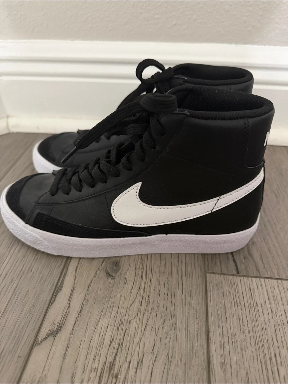 Nike Black High-Top Sneakers with White Swoosh 5.5 Y boys. Never worn